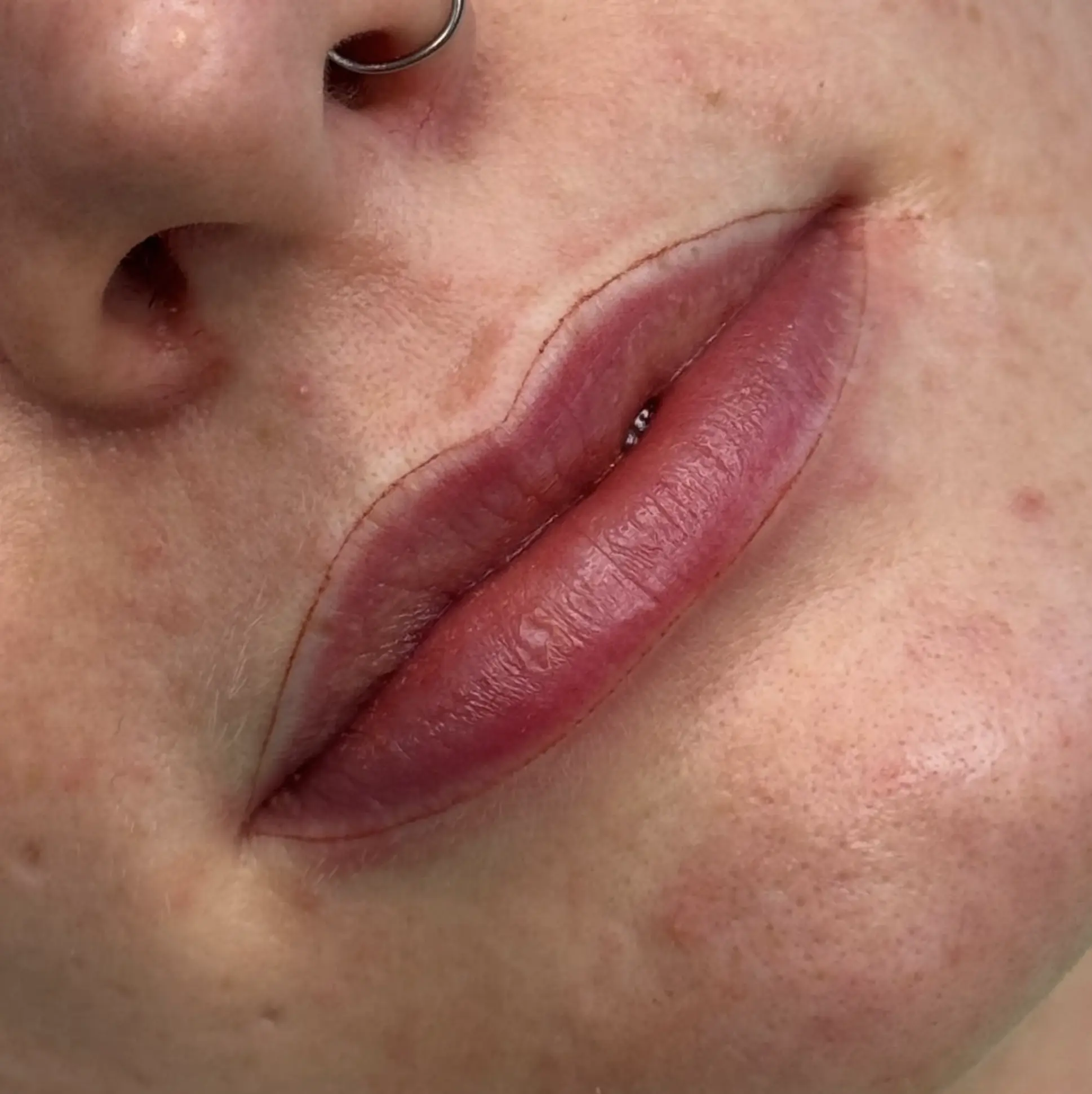 Corrective lip tattoo service
